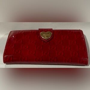 Authentic Gucci Red Embossed Wallet with Heart Clasp